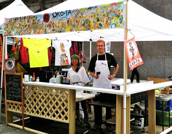 entire booth with tent and servers in view